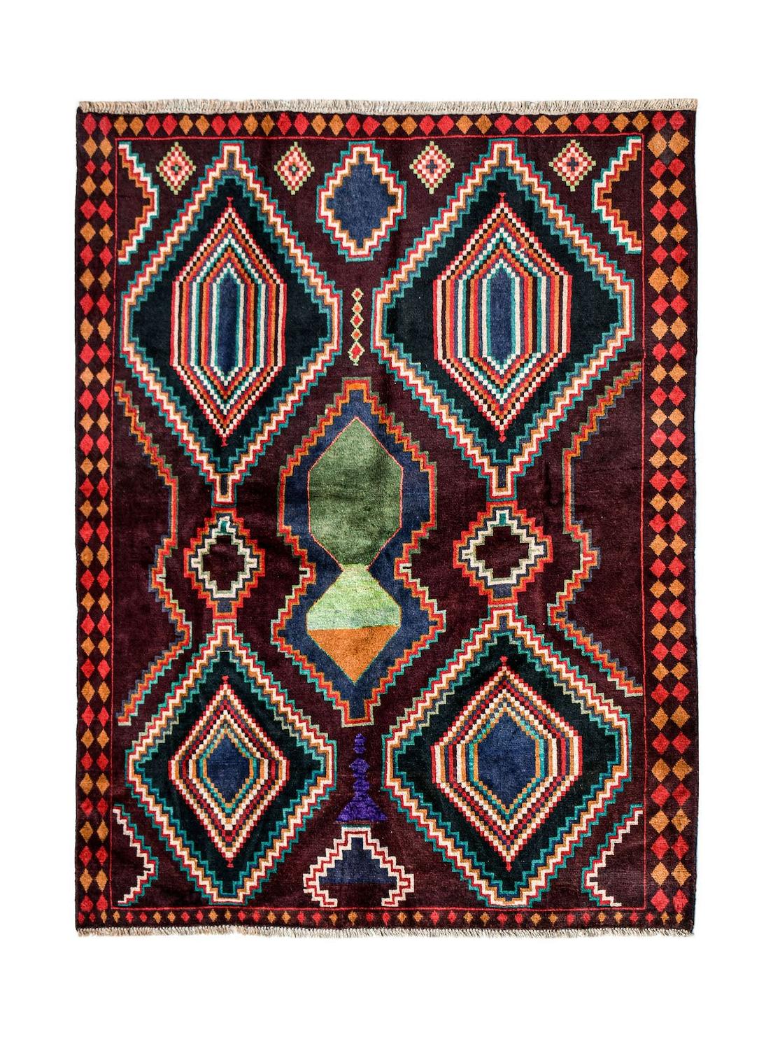Handmade Afghan Pashm rug featuring geometric diamond patterns in dark red, blue, and green tones.
