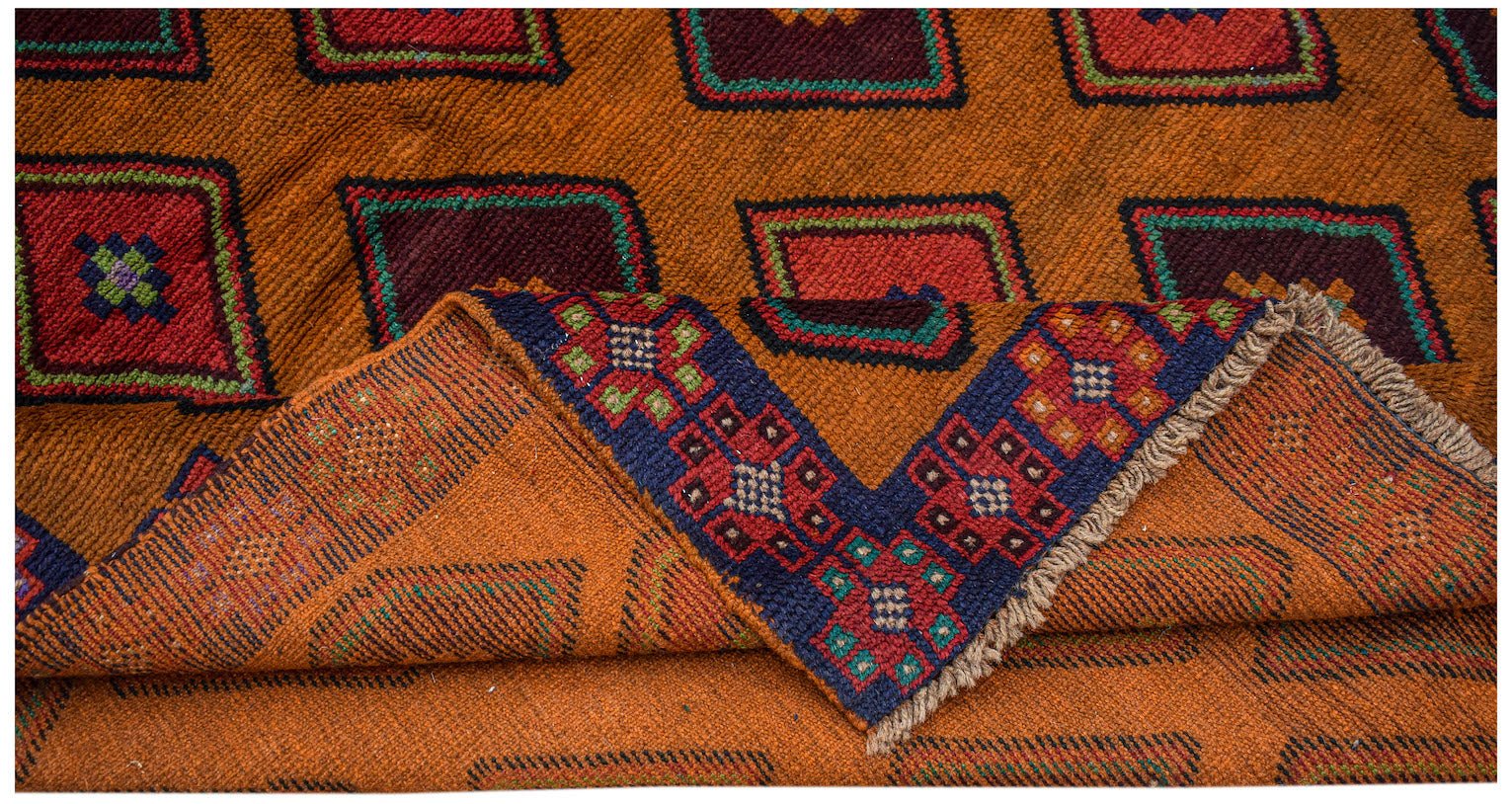 A handmade Afghan Pashm rug featuring a geometric pattern of squares in deep red, brown, and blue.