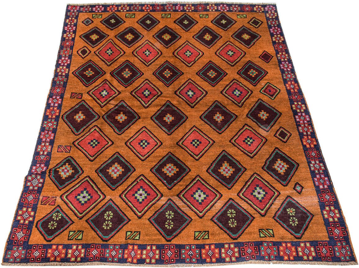 Handmade Afghan Pashm rug featuring a geometric diamond pattern in red, brown, and blue tones.