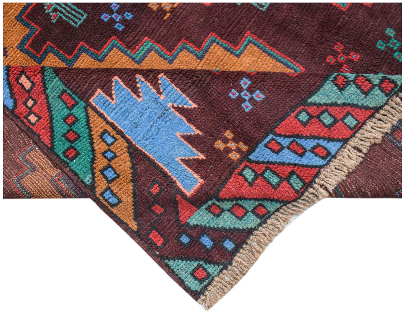 Handmade Afghan wool rug featuring traditional tribal patterns in deep red, brown, and blue tones.
