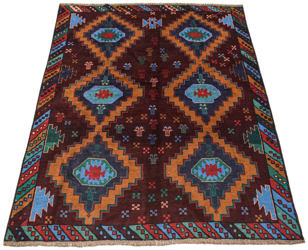 Handmade Afghan Pashm rug featuring a dark brown field with geometric diamond motifs in blue.