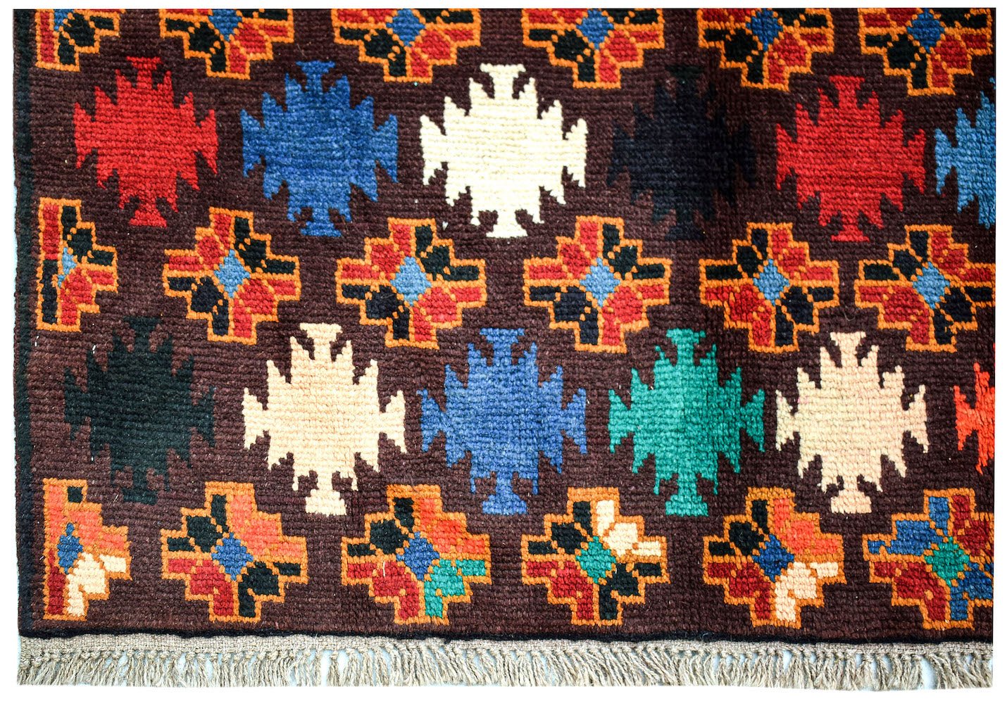 Handmade Afghan Pashm rug featuring a dark brown field with colorful geometric tribal motifs.