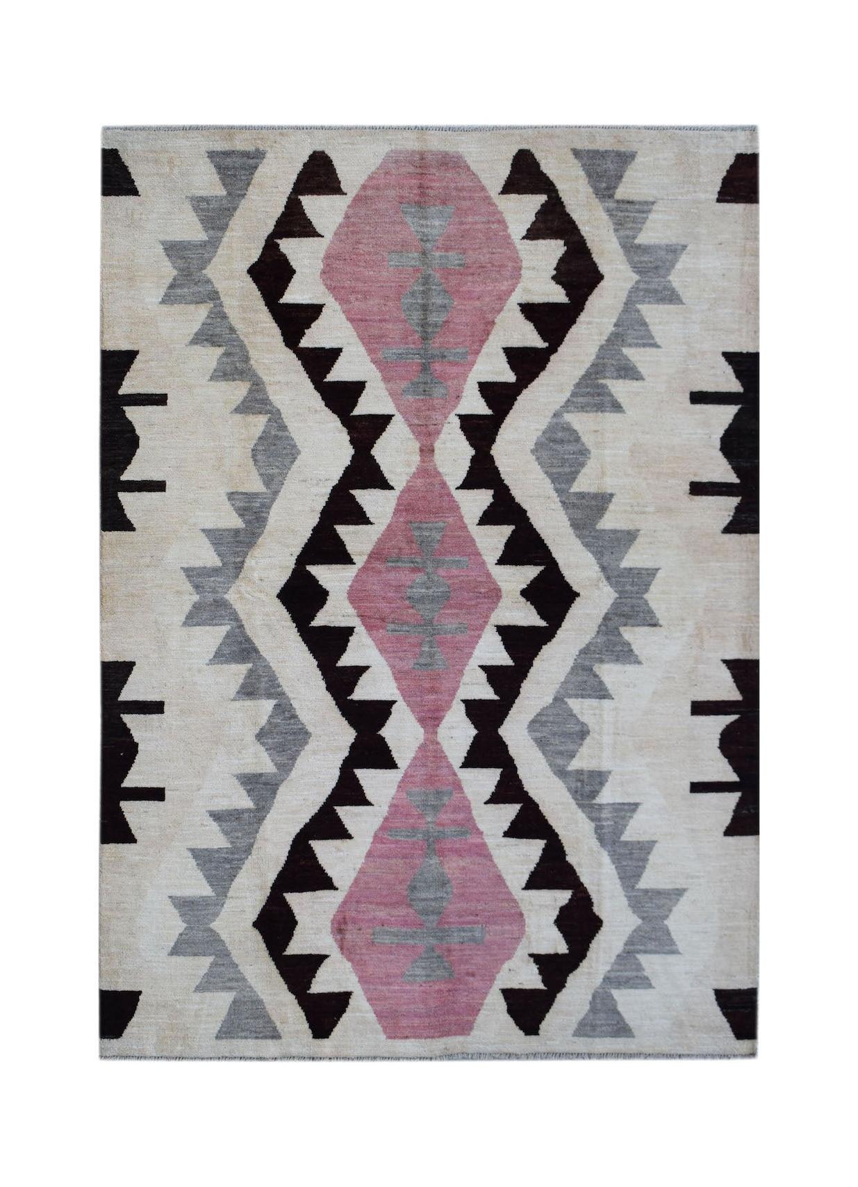 Handmade Afghan wool rug featuring a geometric tribal pattern in pink, grey, and black.