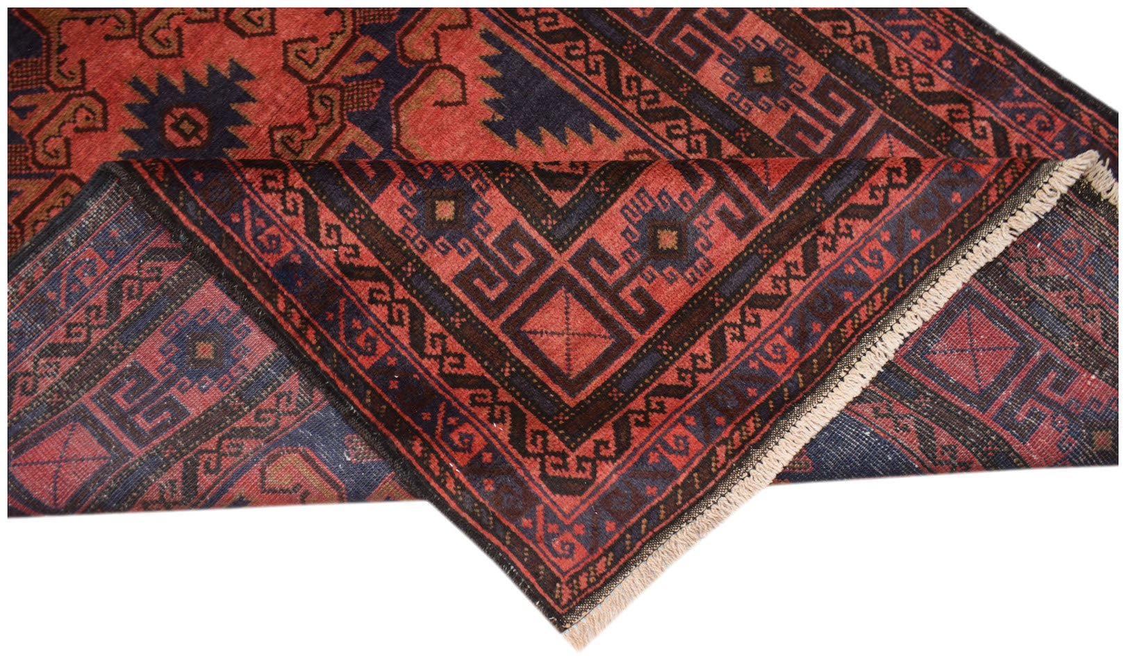 A vintage handmade Afghan Baluch rug featuring geometric patterns in deep red and navy blue.