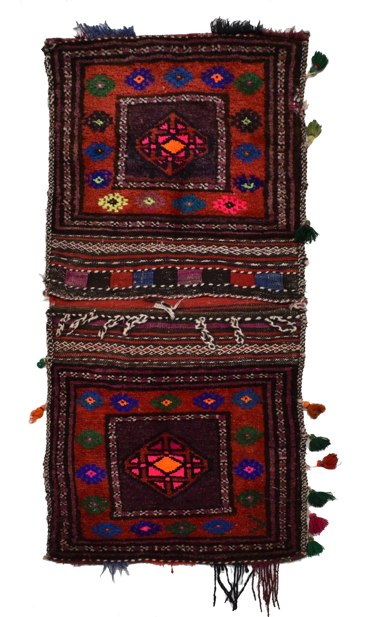 A vintage handmade Afghan wool saddle bag featuring two square panels with geometric motifs.