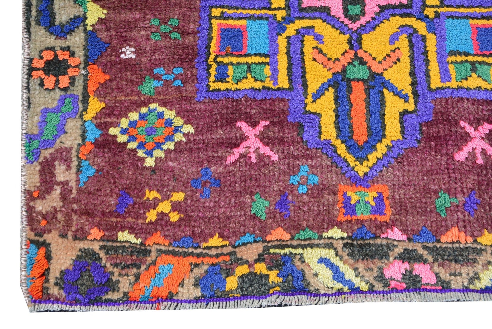 Vintage Kurdish Herki runner with colorful tribal motifs.