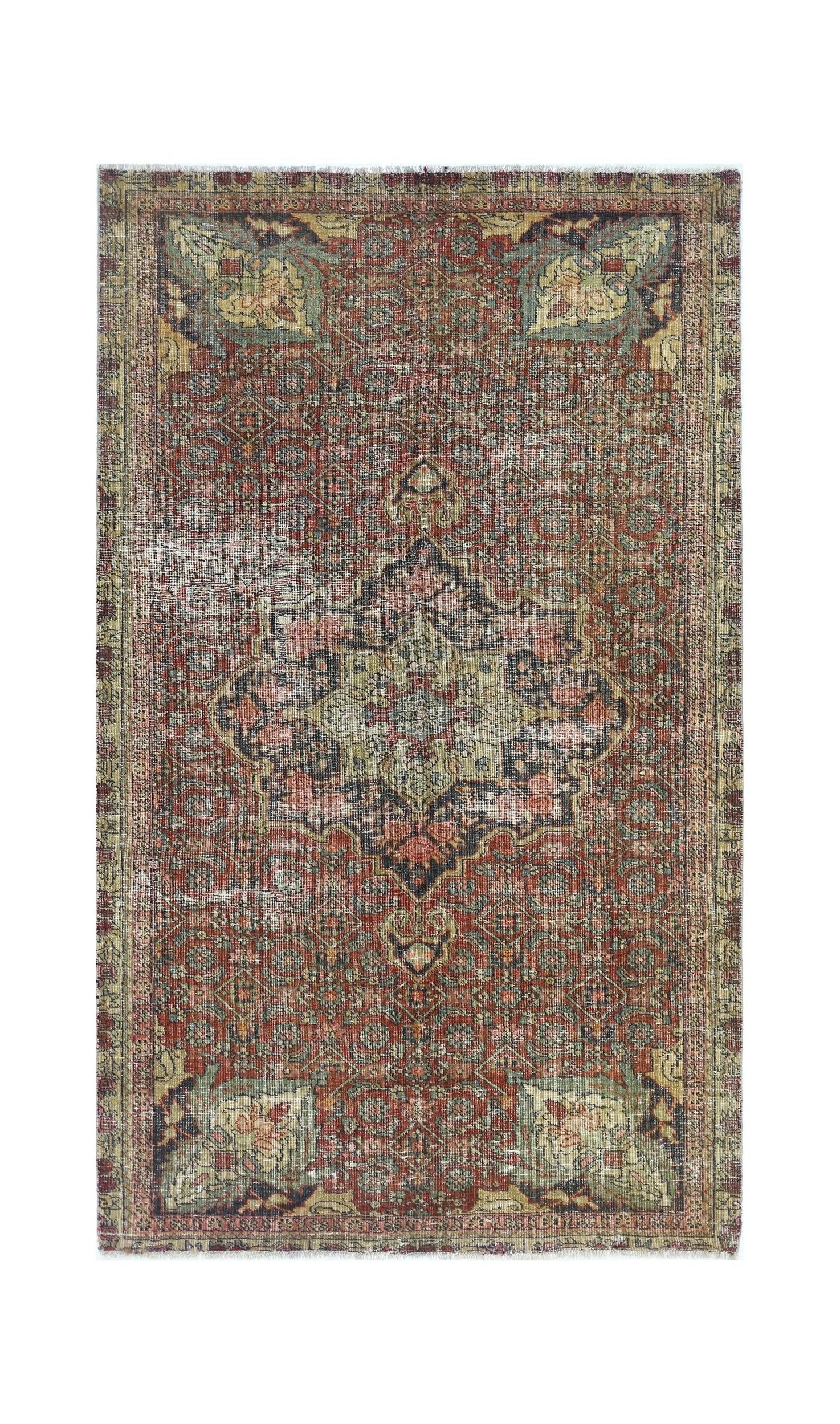 A vintage handmade Persian Bakhtiari rug featuring a central medallion on a red patterned field.