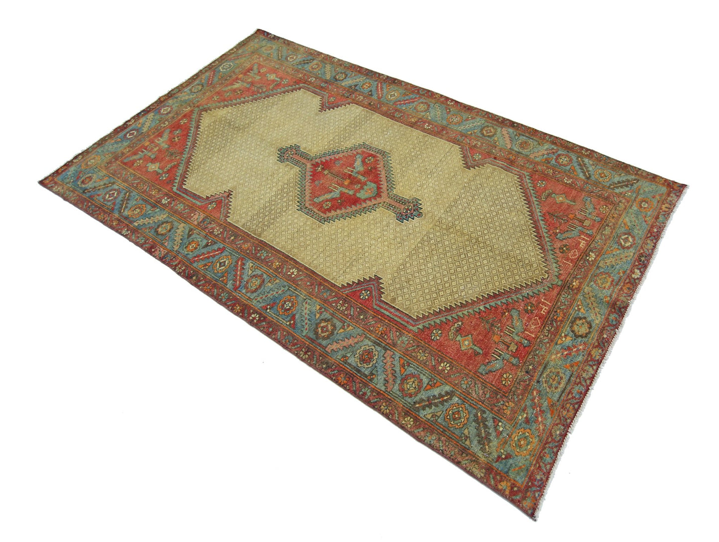 A vintage Persian Bibikabad rug featuring a central red medallion on a beige field with blue borders.