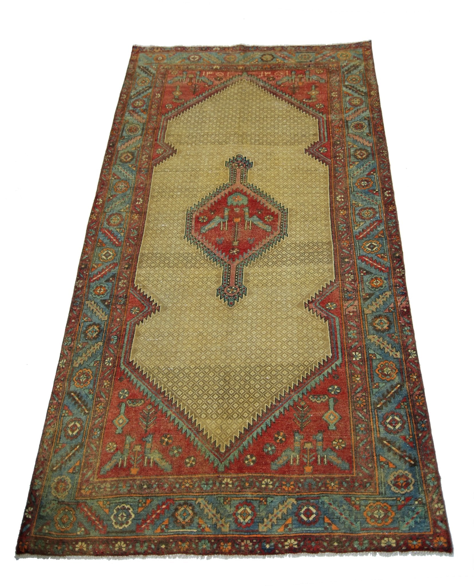 Vintage Persian Bibikabad rug featuring a central geometric medallion on a beige field.