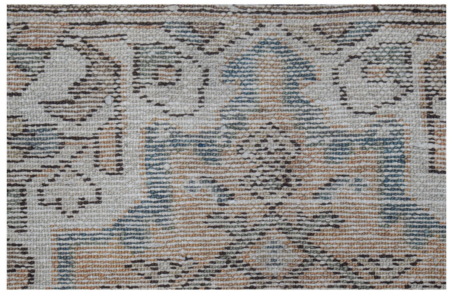 A handwoven vintage Persian runner featuring a faded geometric pattern in blue and tan tones.