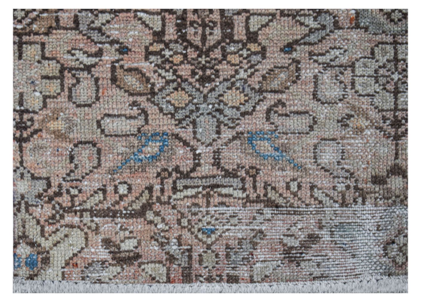 A vintage handwoven Persian Hamadan runner featuring intricate geometric patterns in muted tones.