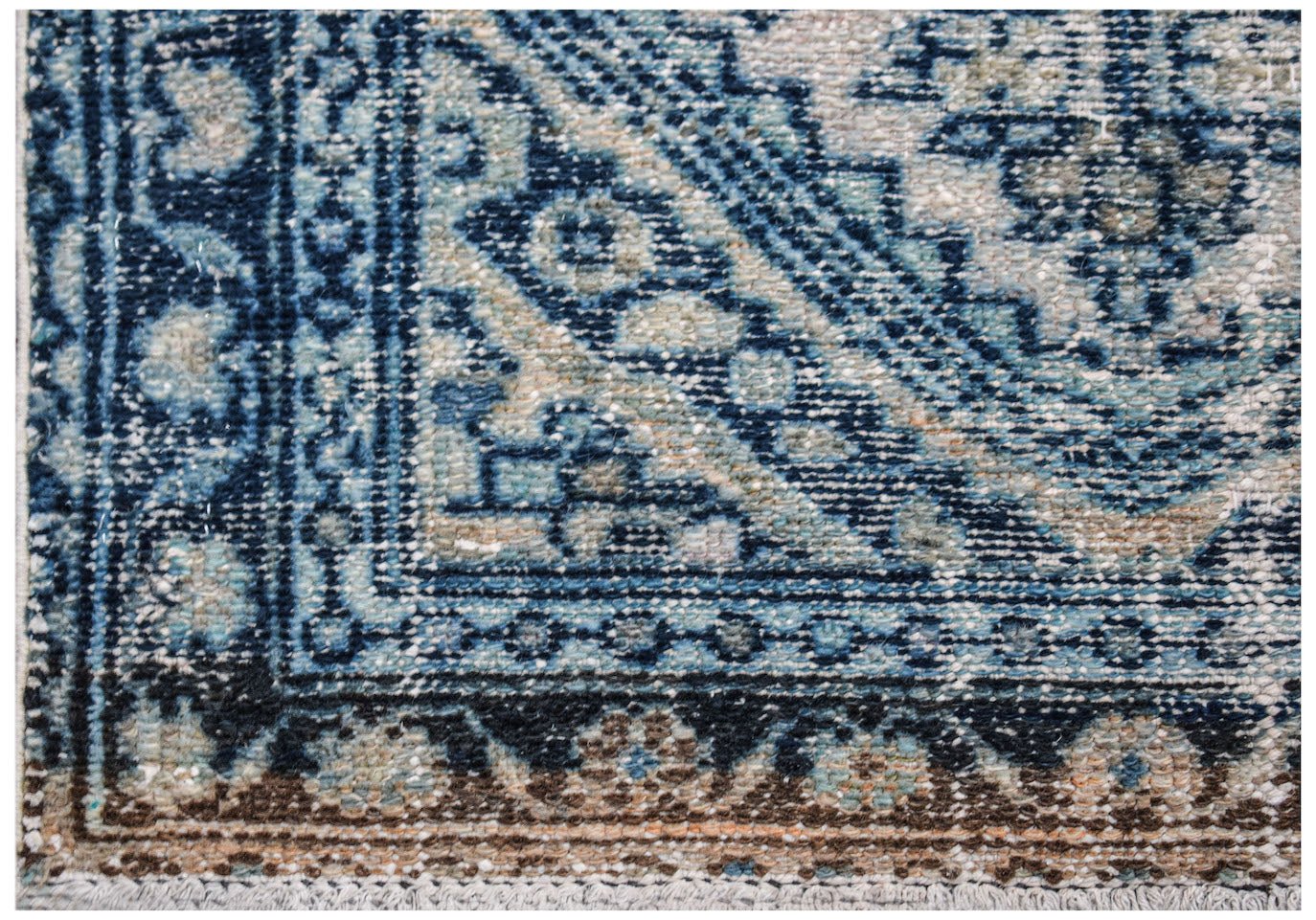 A vintage Persian Hamadan runner featuring a blue and brown geometric pattern on wool.
