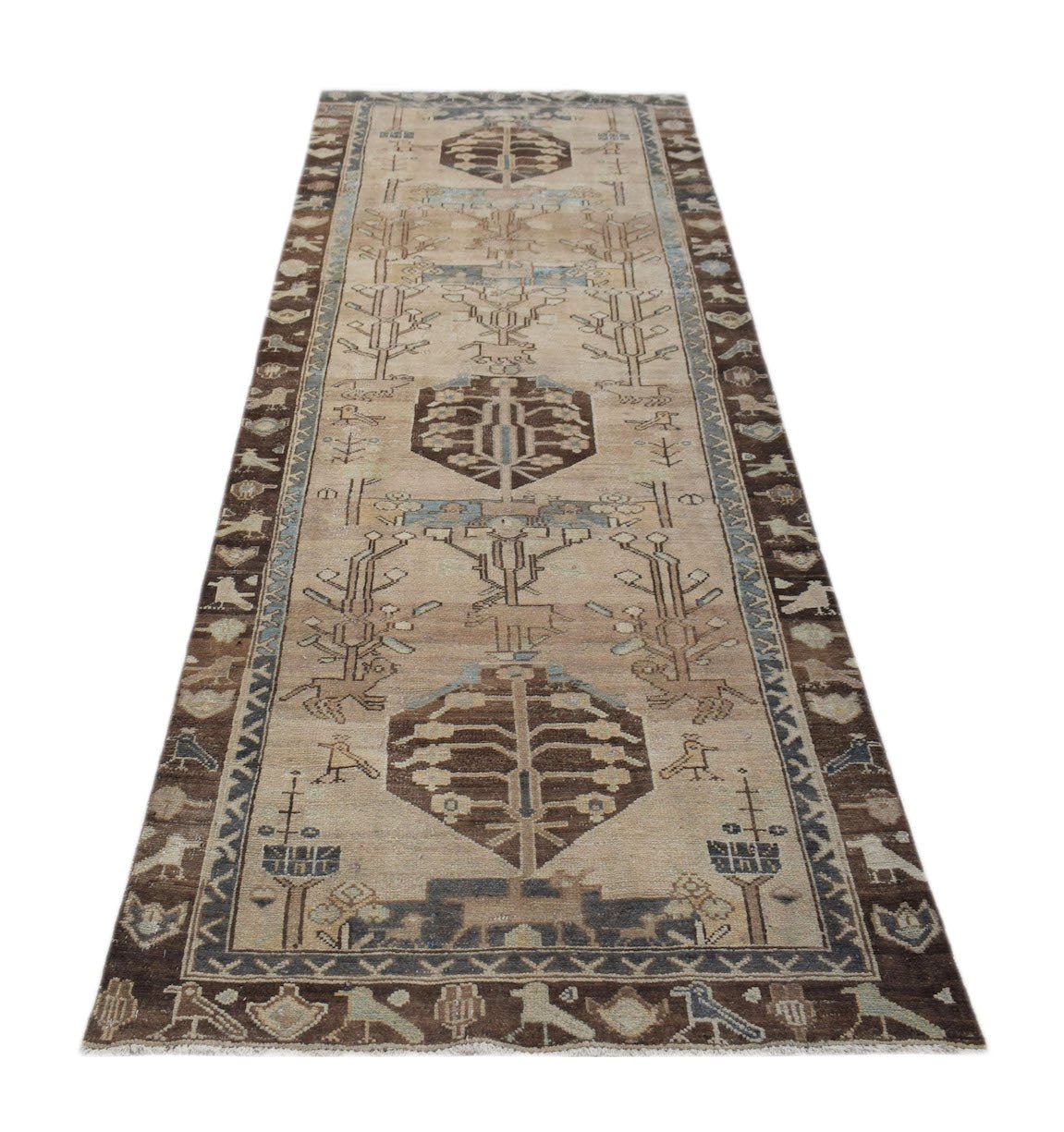 A vintage handwoven Persian Hamadan runner featuring geometric tree motifs in brown and beige.