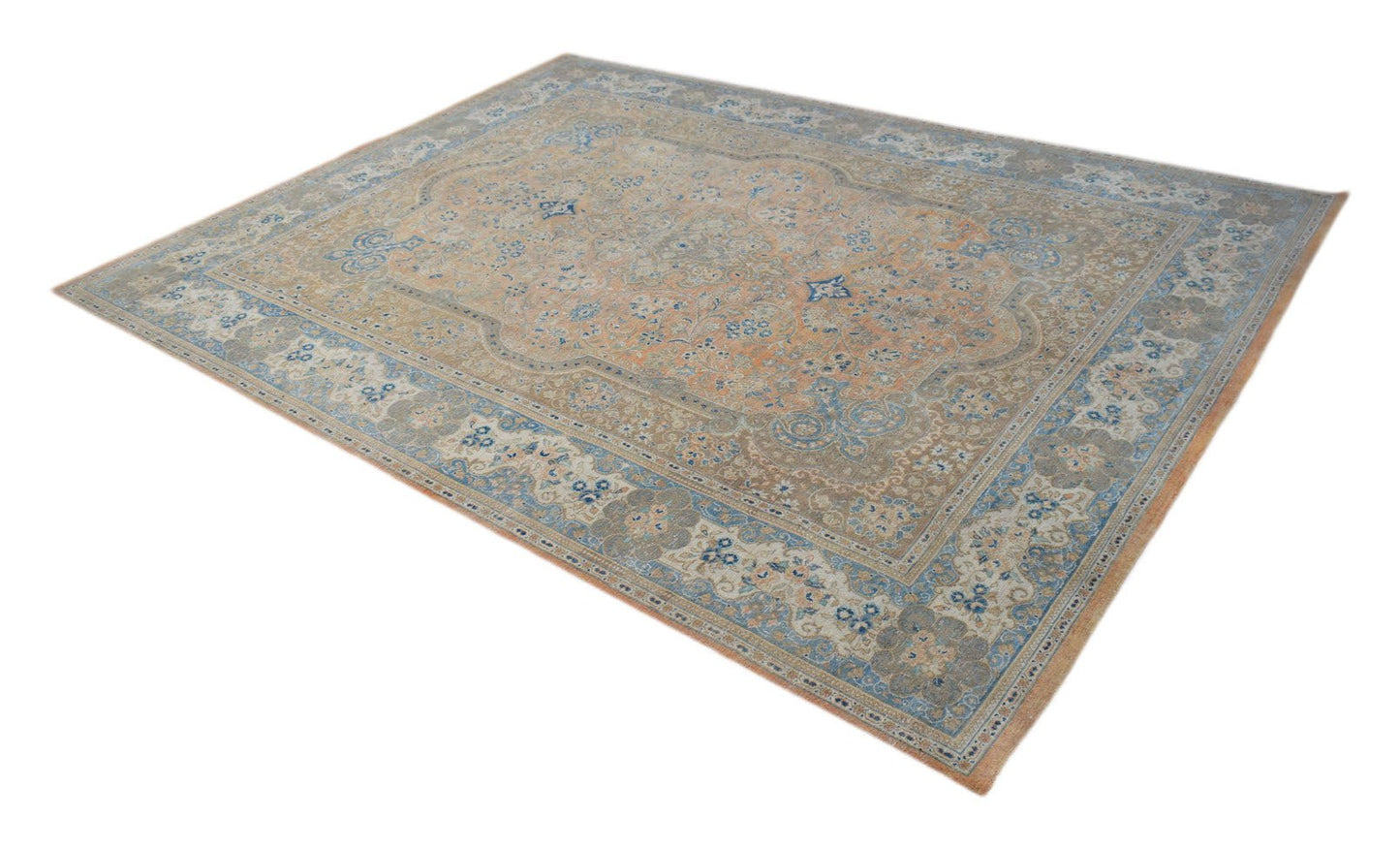 A vintage Persian Kashan rug featuring intricate floral patterns in soft blue and orange tones.