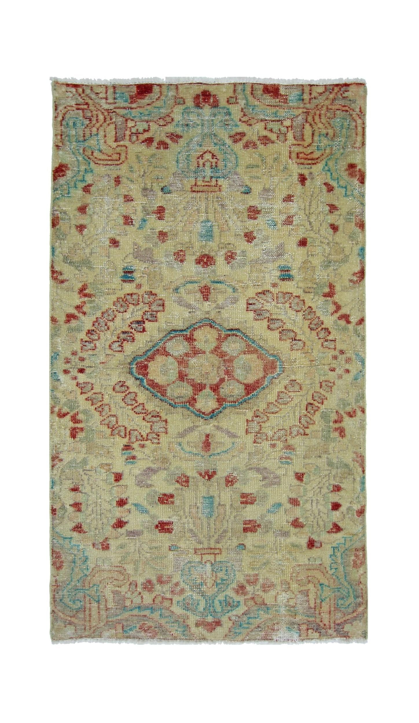 A vintage Persian rug featuring a central geometric medallion in red and blue on a beige field.