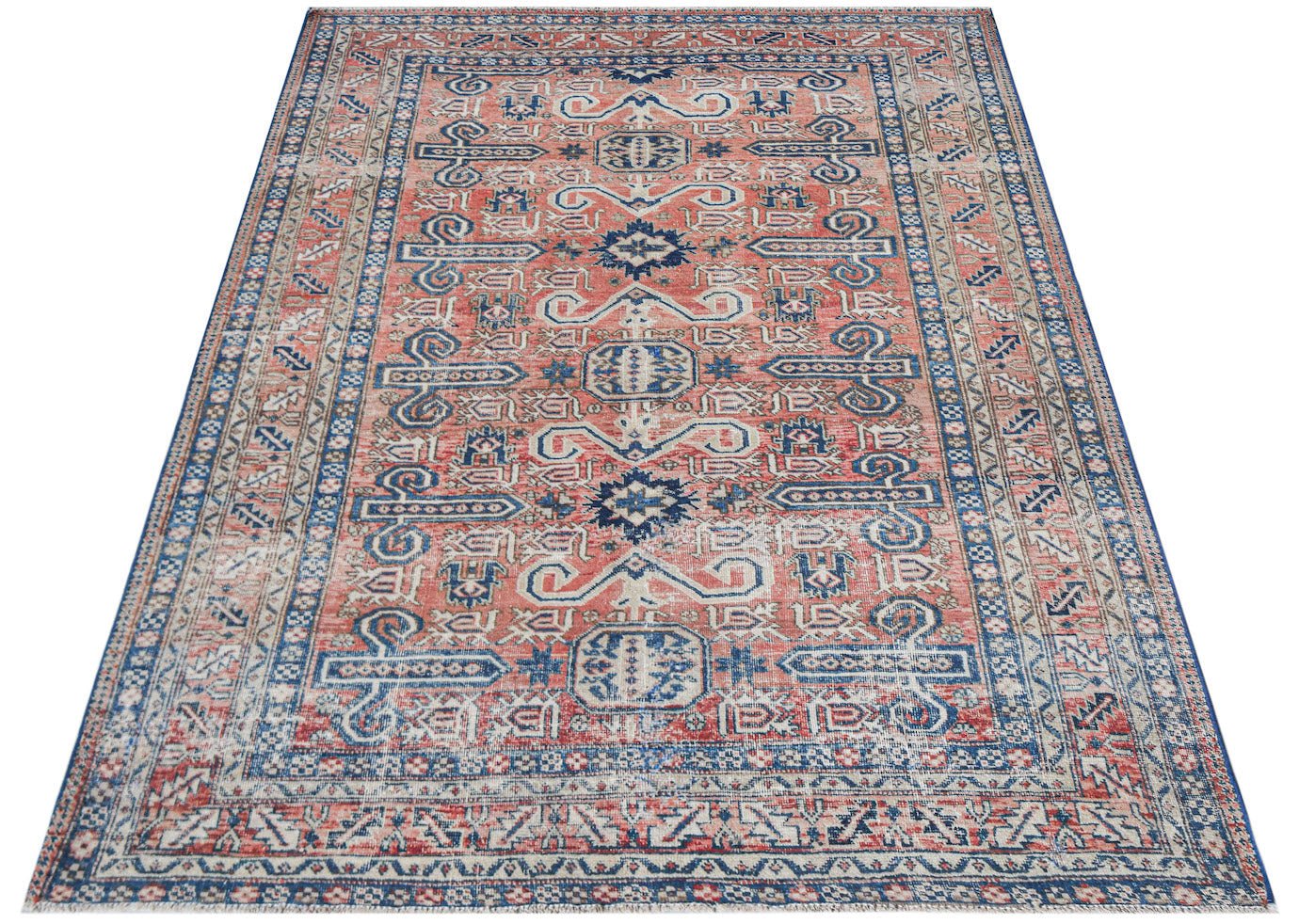Vintage Persian rug with a coral and blue geometric pattern.