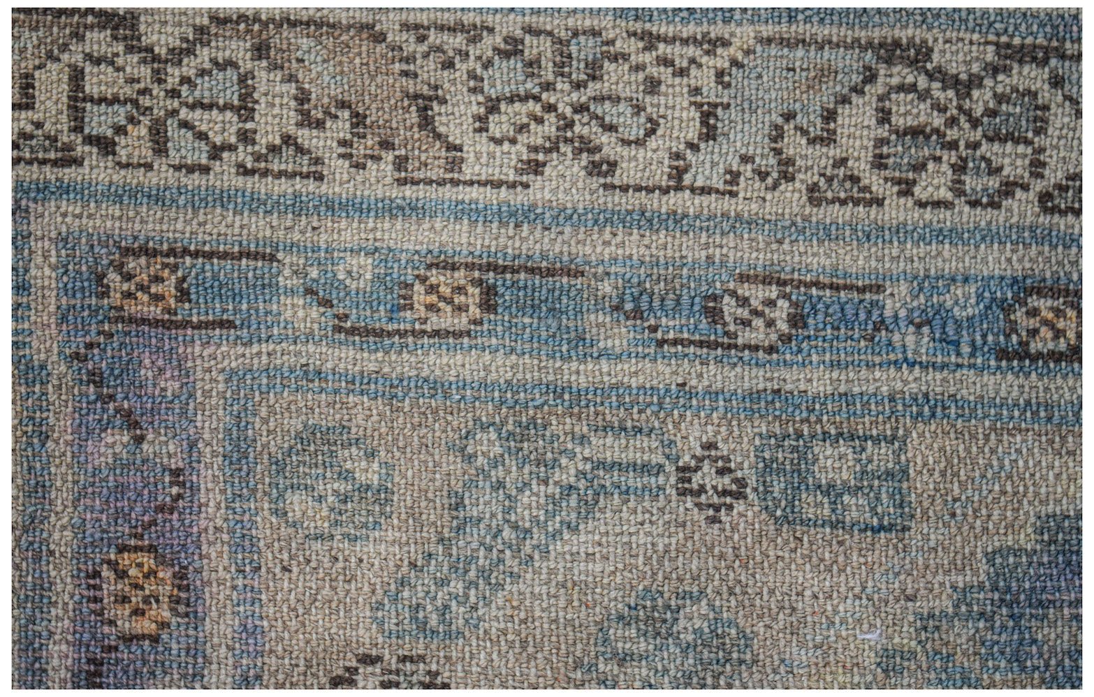 Vintage Persian Malayer rug with intricate blue and brown patterns.