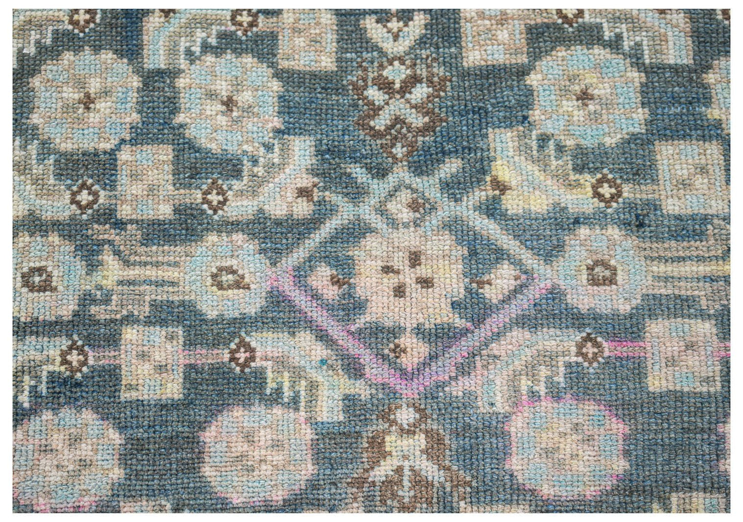 Vintage Persian Malayer rug with a blue background and floral patterns.