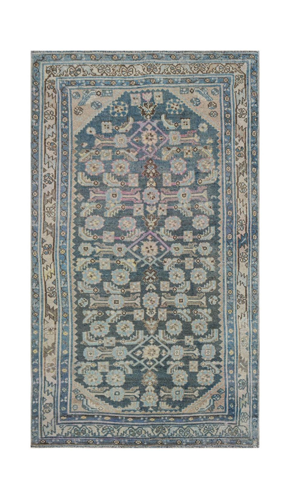 Vintage Persian Malayer rug with a blue field and floral motifs.