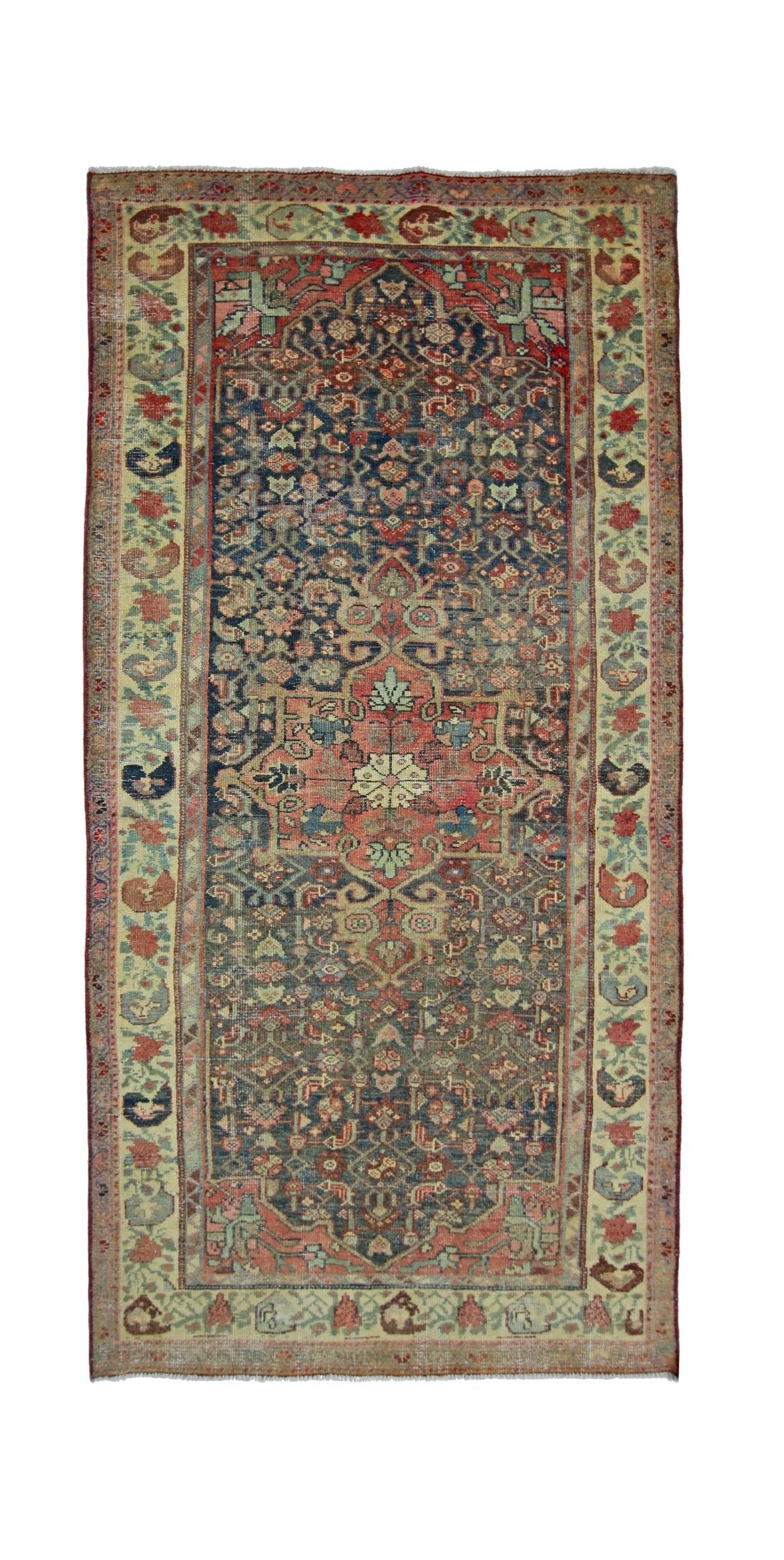 A rectangular vintage Persian rug featuring a traditional floral pattern in red, blue, and cream.