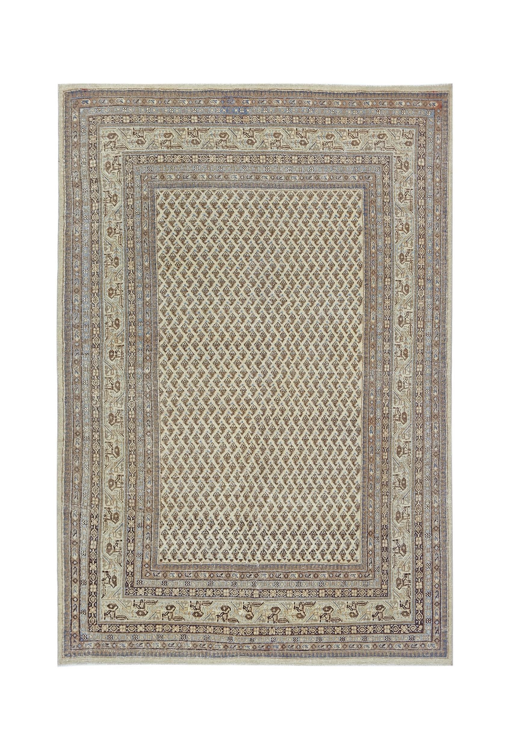A vintage Persian Saraband rug featuring a repeating diamond pattern in neutral tones.