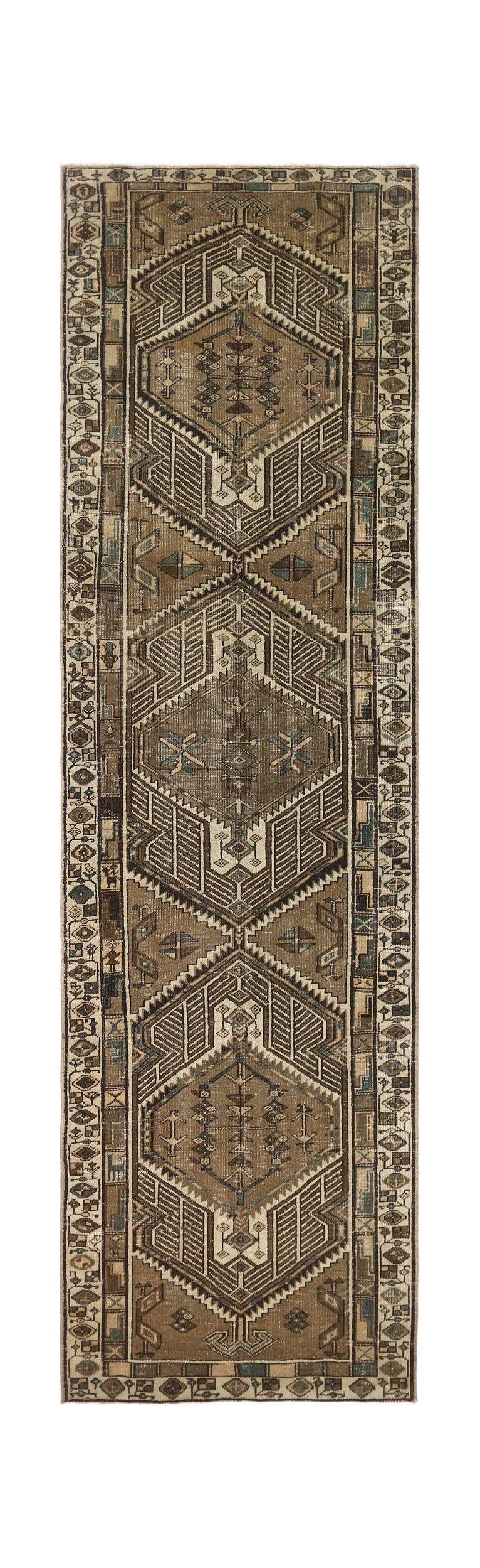 A vintage Persian Serab runner featuring three geometric medallions in earthy brown tones.