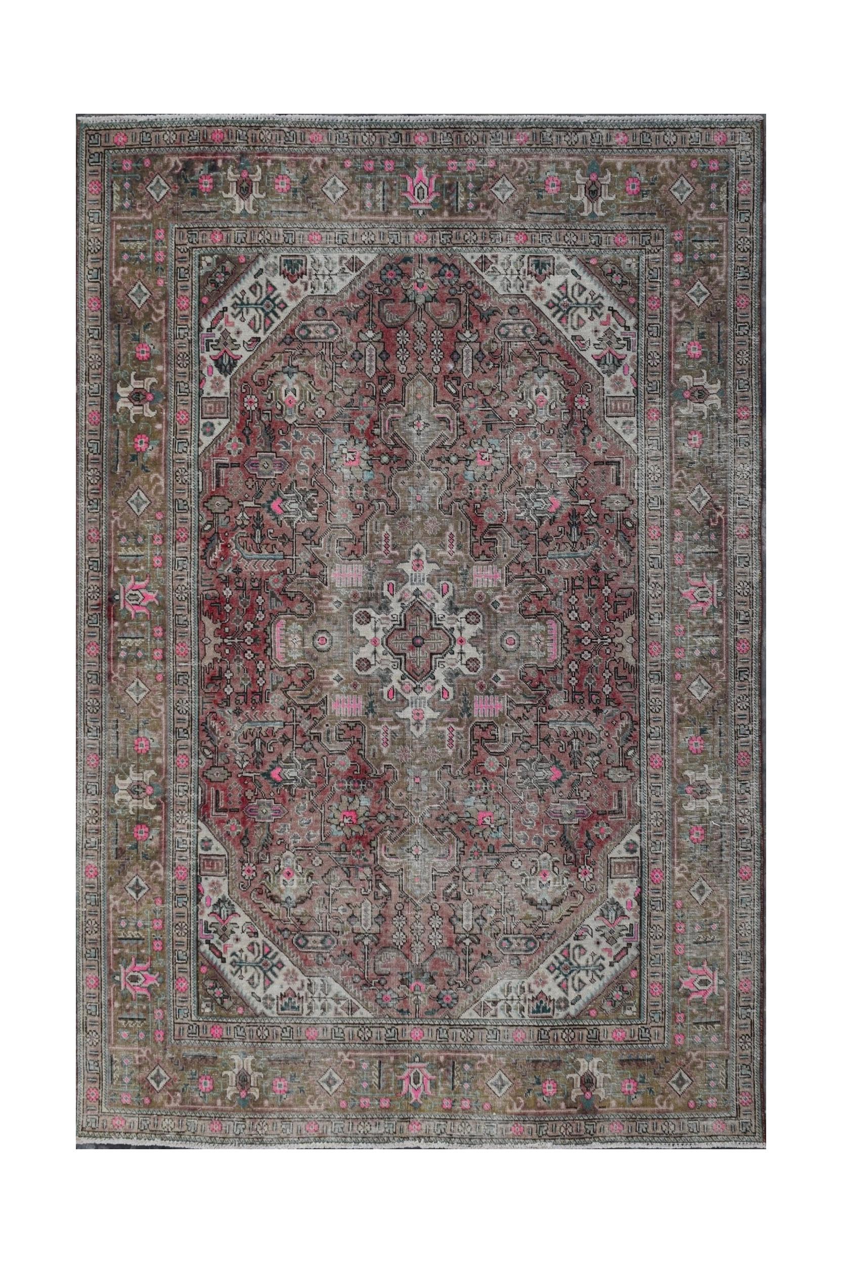 A vintage handwoven Persian Tabriz rug featuring intricate floral patterns in muted red and grey.