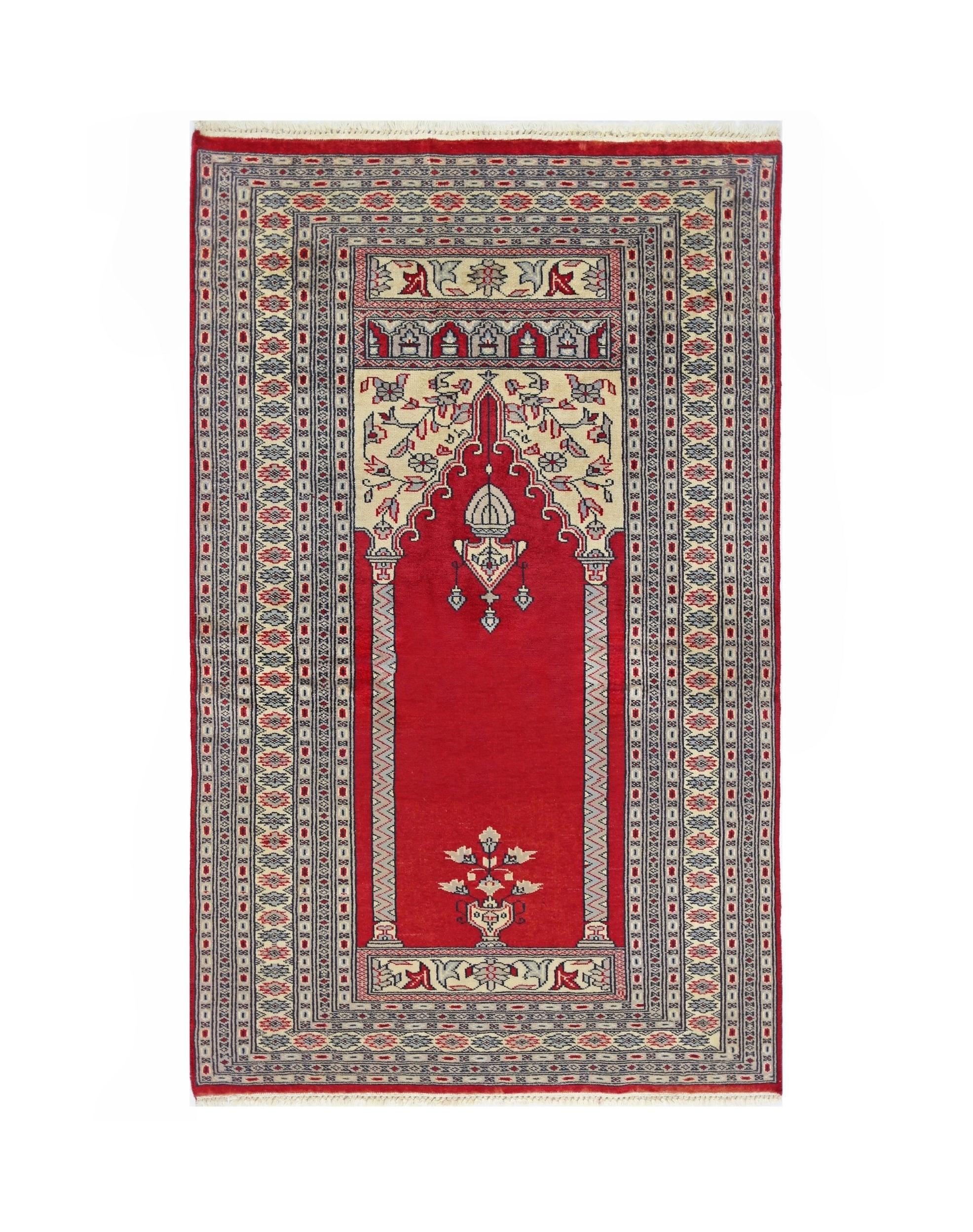 A vintage Turkish Kayseri prayer rug featuring a central red mihrab design with floral motifs.