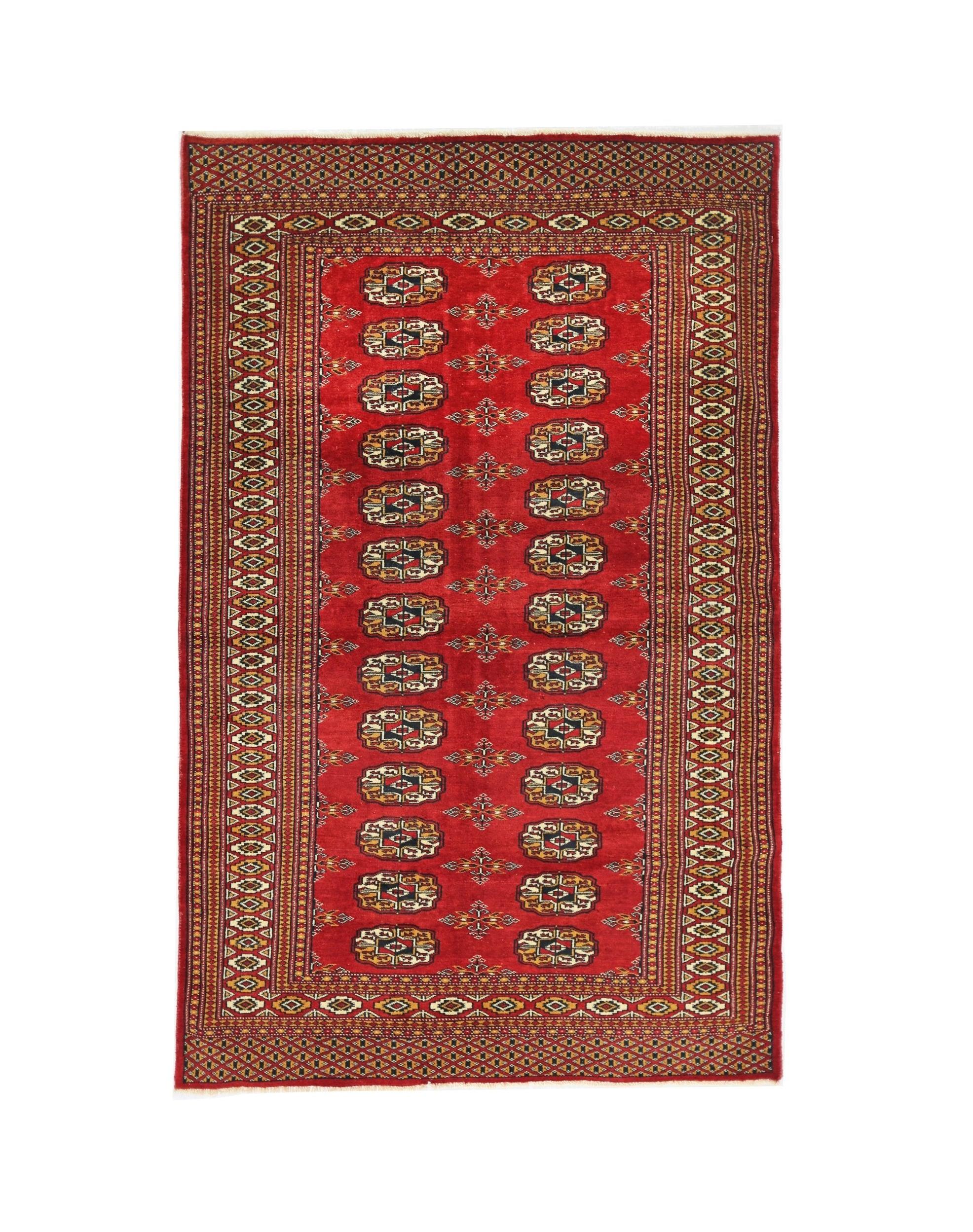 A vintage Pakistani Princess Bokhara rug featuring a red field with repeating geometric motifs.