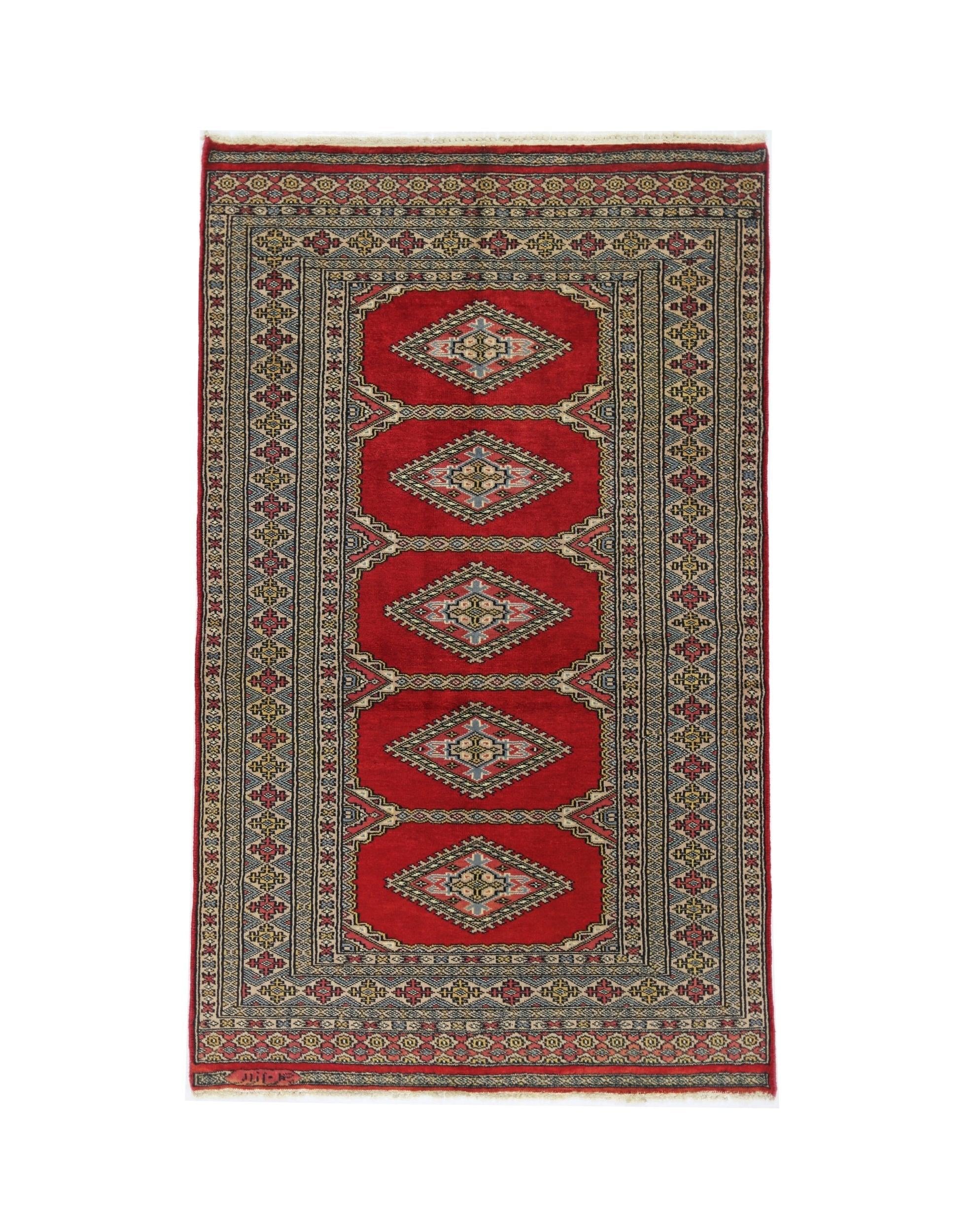 A vintage Pakistani Princess Bokhara rug featuring five diamond medallions on a vibrant red field.