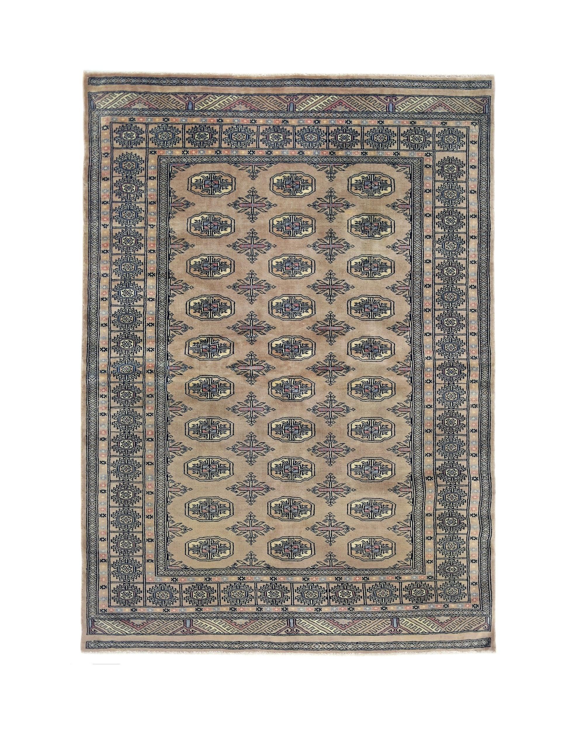 A vintage Pakistani Princess Bokhara rug featuring a tan field with repeating geometric motifs.
