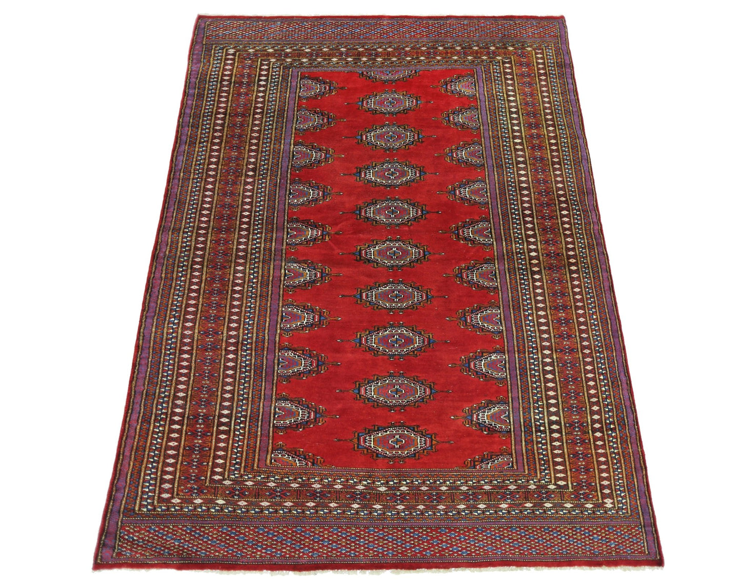 A vintage Pakistani Princess Bokhara rug featuring a red field with repeating geometric motifs.