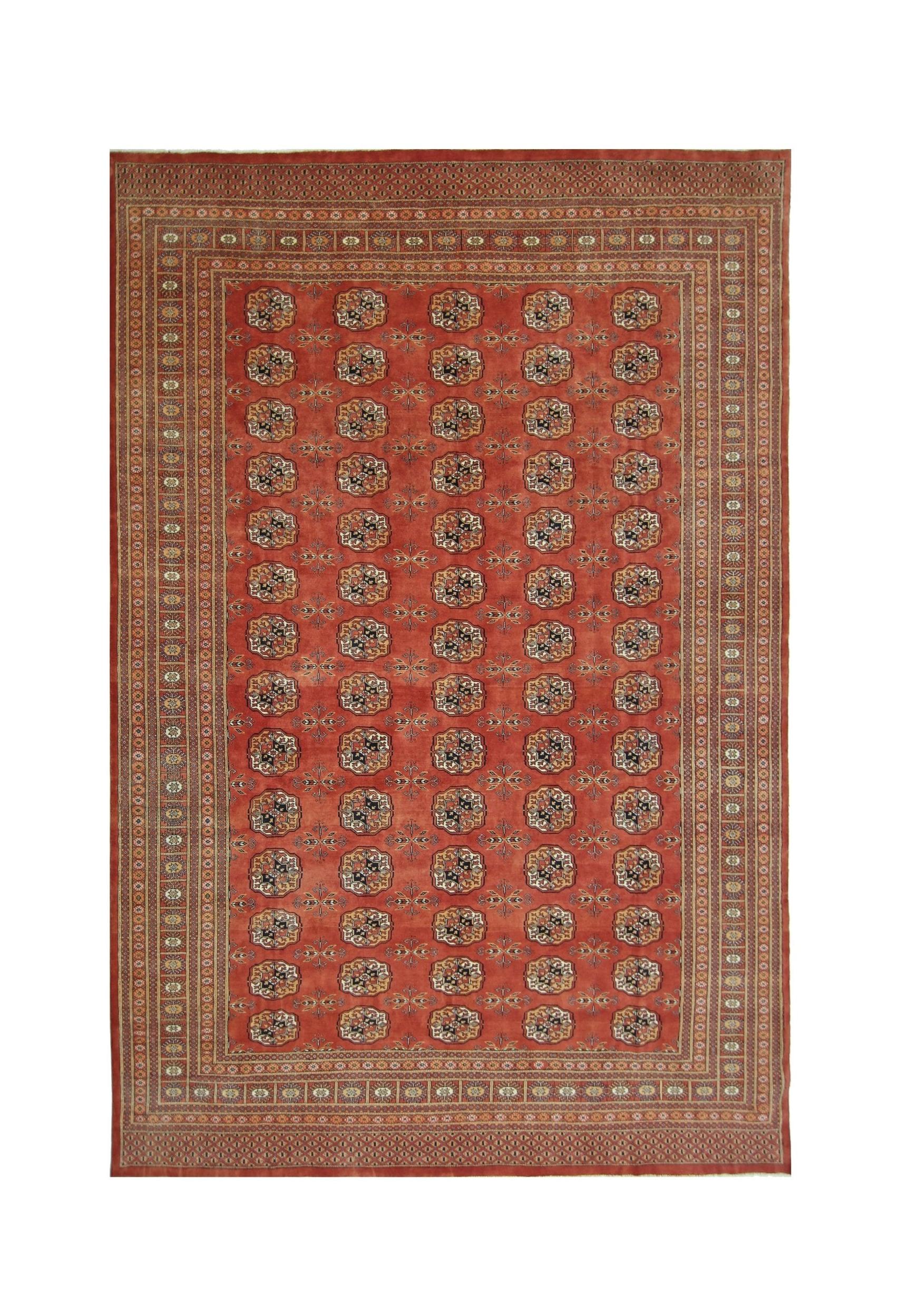 A vintage Pakistani Princess Bokhara rug featuring a repeating octagonal pattern on a red field.