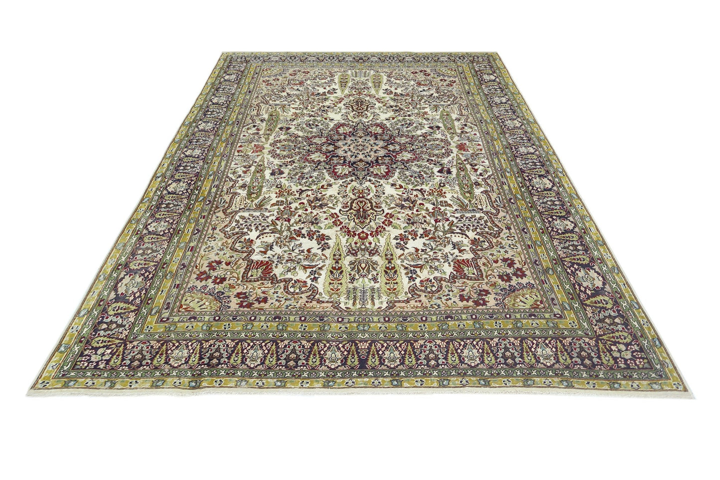 A vintage Turkish Kayseri rug featuring an intricate floral pattern in red, green, and cream tones.