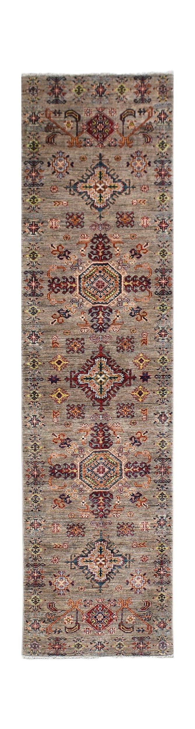 Handwoven Afghan Chobi runner rug featuring traditional geometric patterns in earthy wood tones.