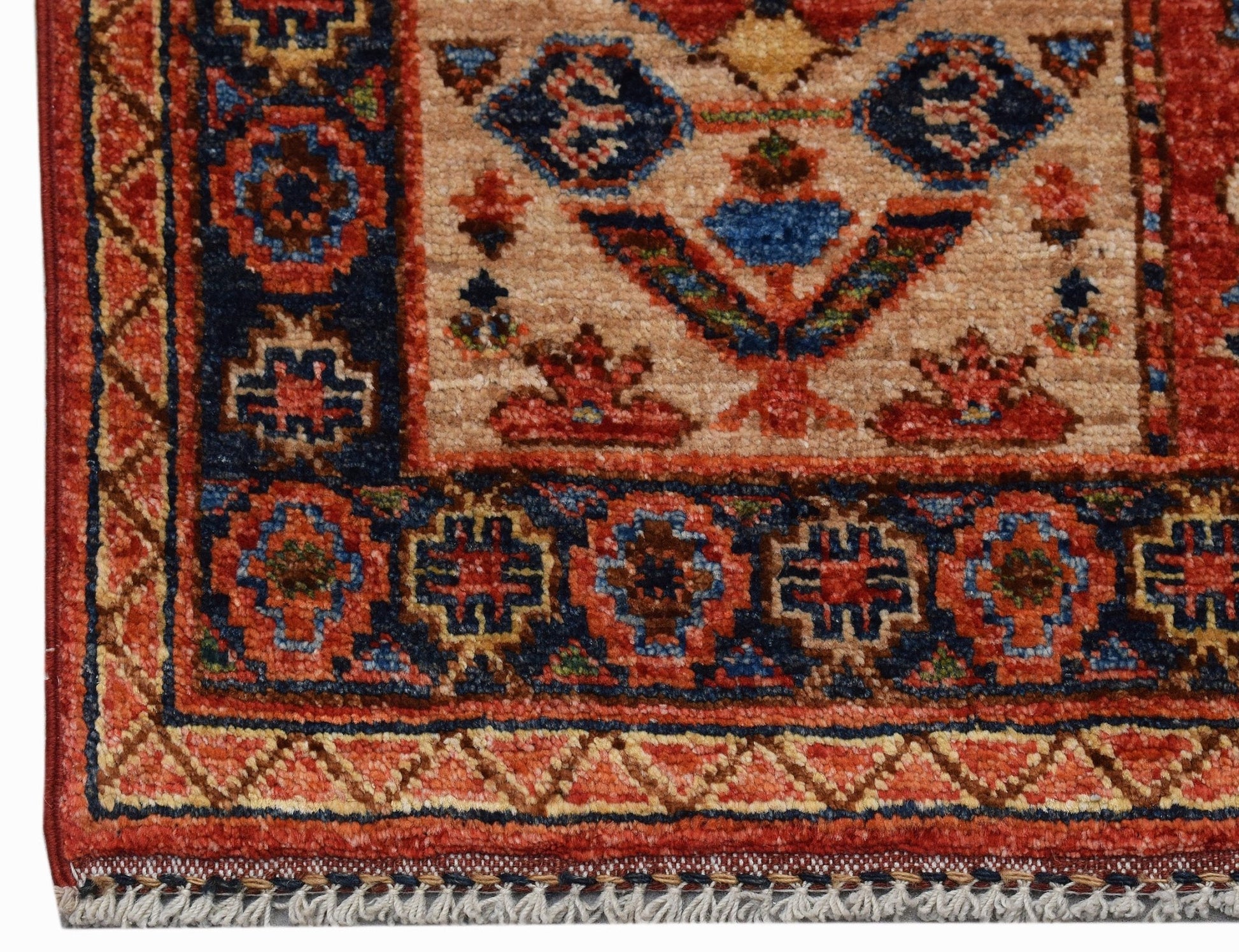 A handmade Afghan Chobi prayer rug featuring traditional geometric patterns in red, blue, and tan.