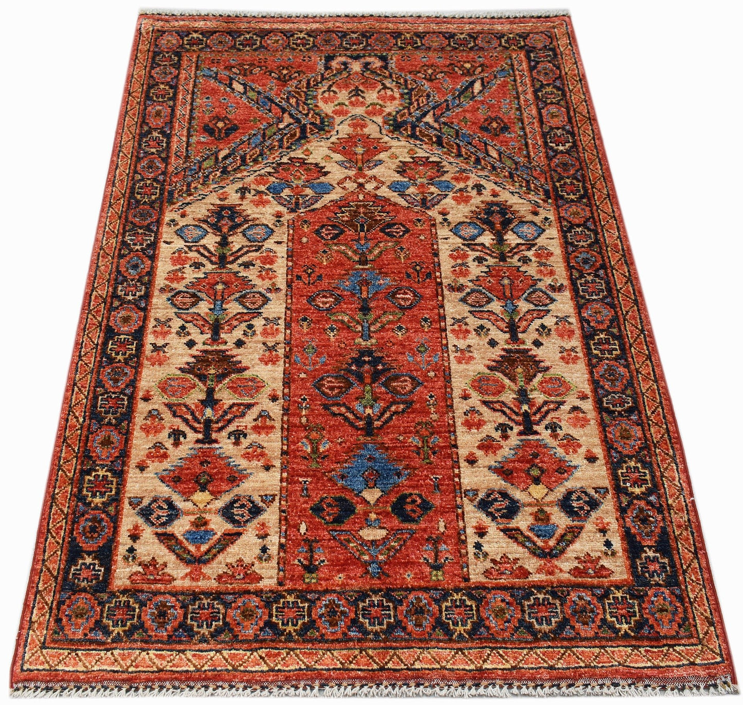 A handmade Afghan Chobi prayer rug featuring a traditional floral pattern in red and beige tones.
