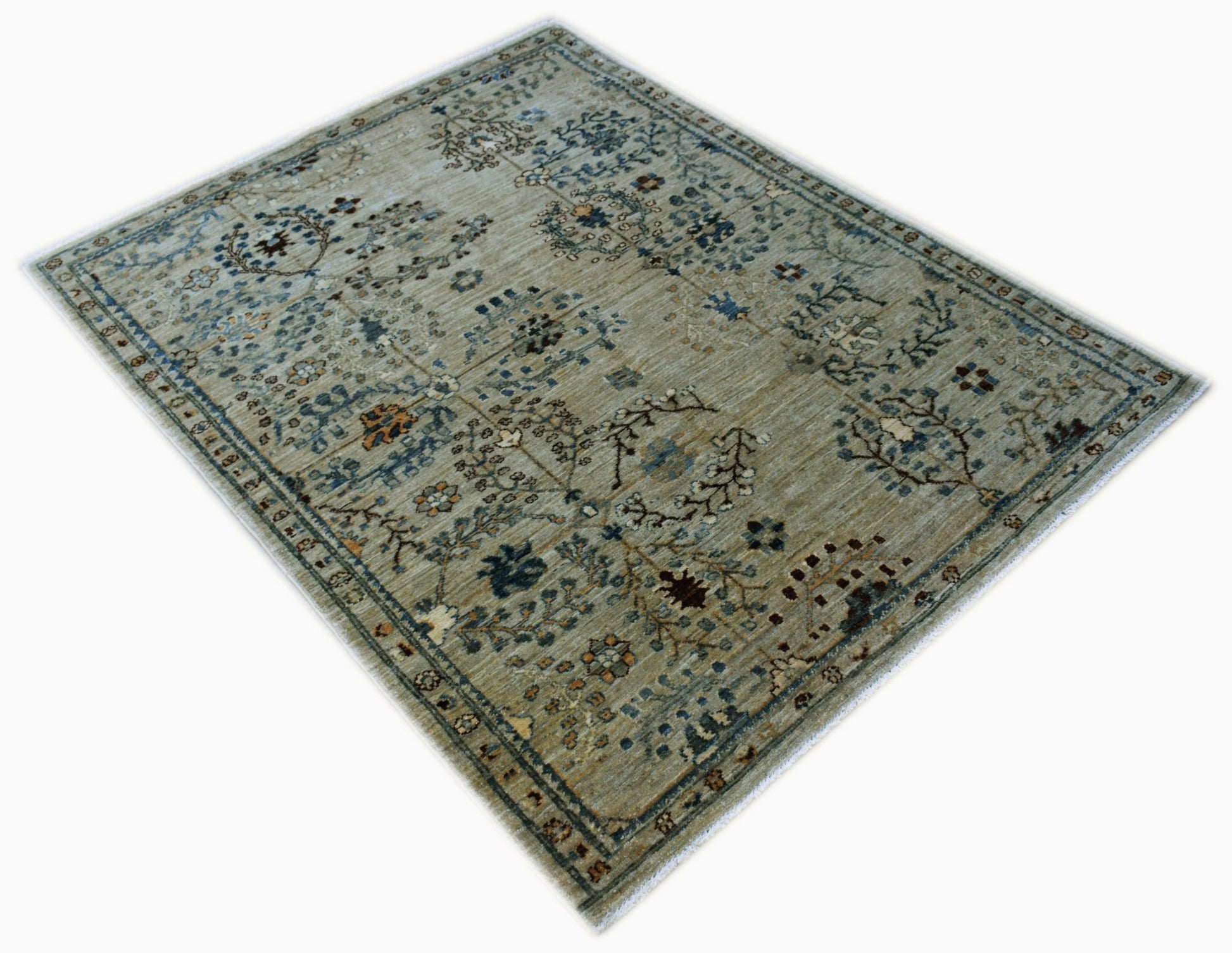 A rectangular Afghan Chobi rug featuring traditional floral patterns in muted earth tones.