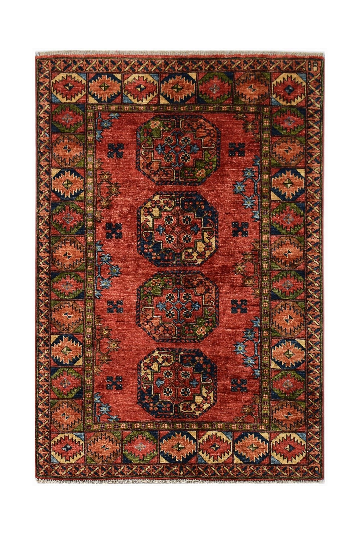 Handwoven Afghan Chobi rug featuring four geometric medallions on a red field with a patterned border.