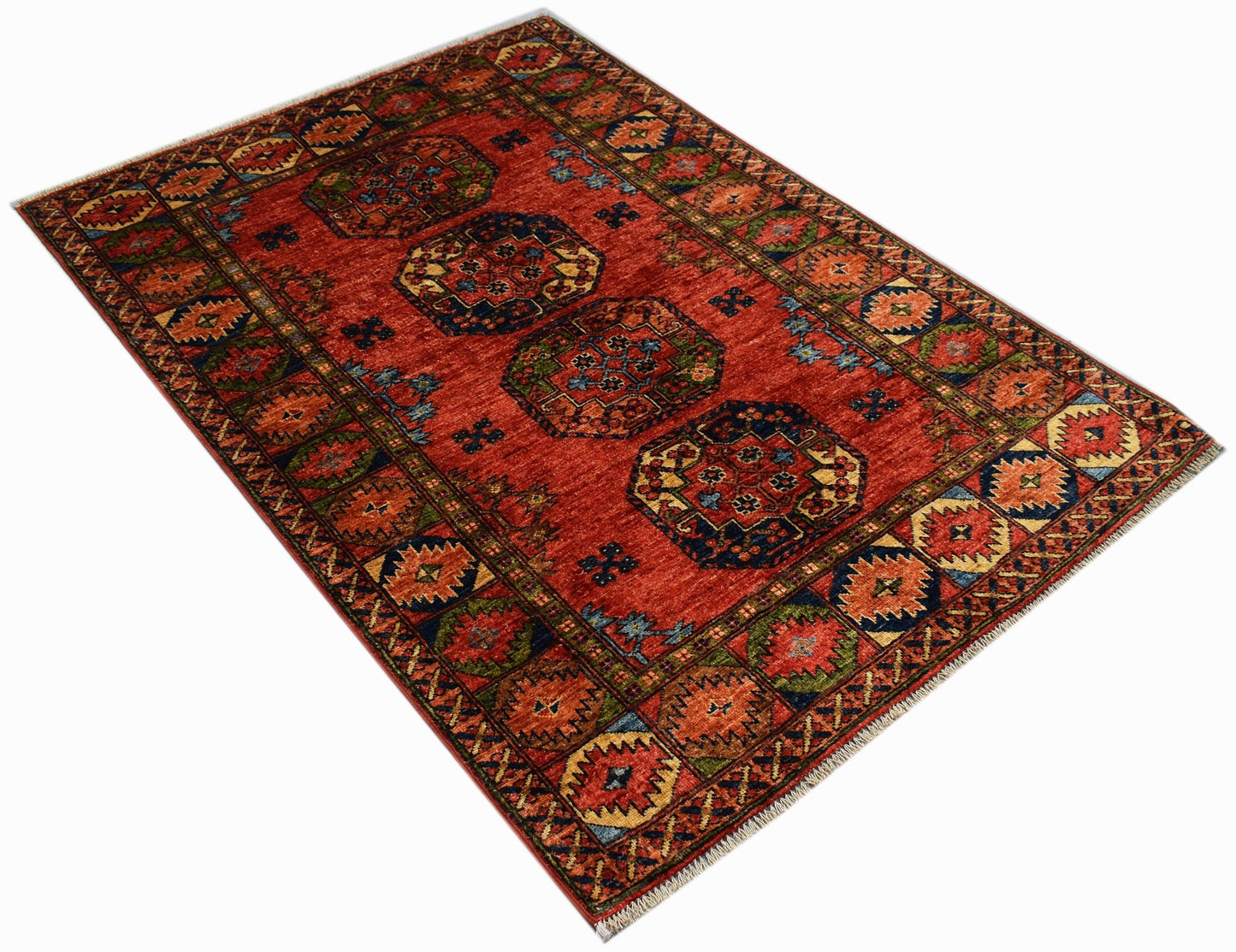 A rectangular Afghan Chobi rug featuring traditional geometric patterns in red and blue tones.
