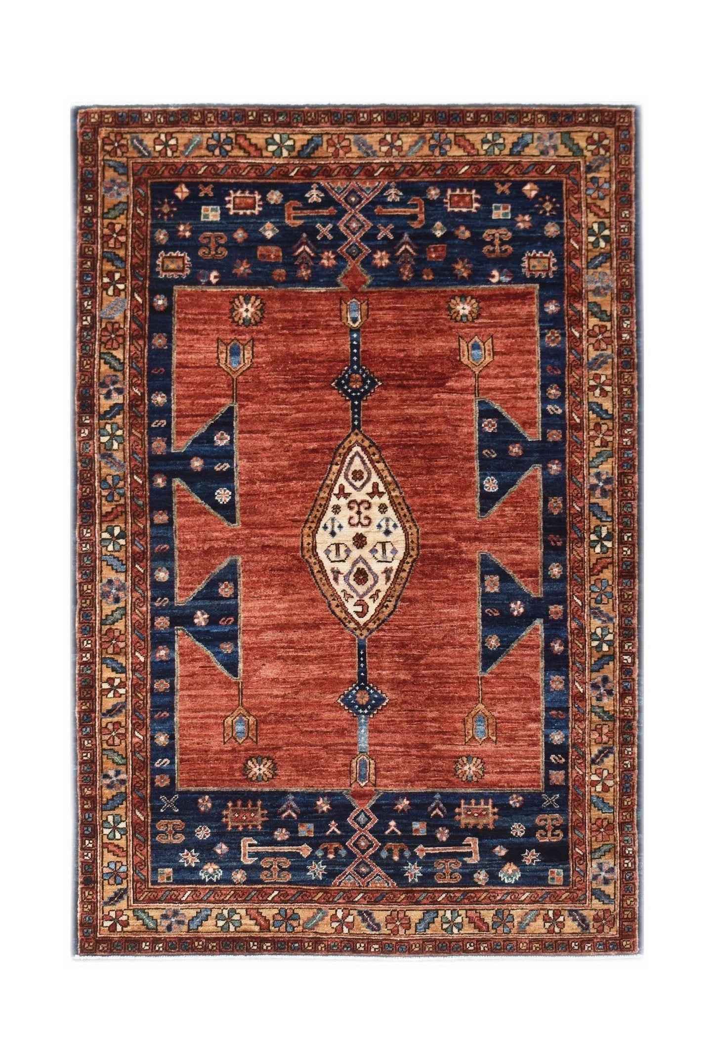 Handwoven Afghan Chobi rug featuring a central diamond medallion on a rust red field.