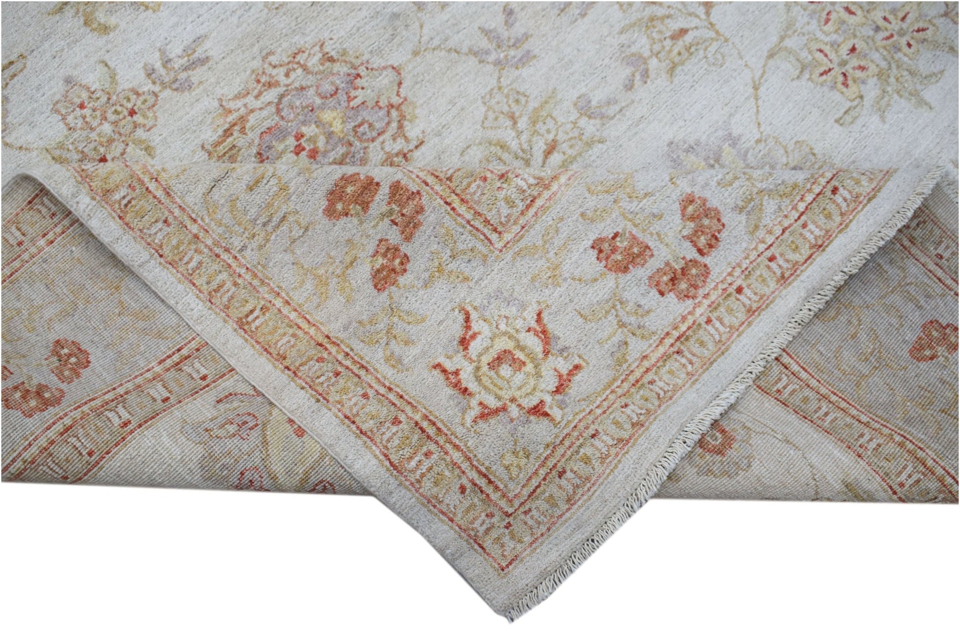 A handwoven Afghan Chobi rug featuring a floral pattern in soft earth tones on a cream background.