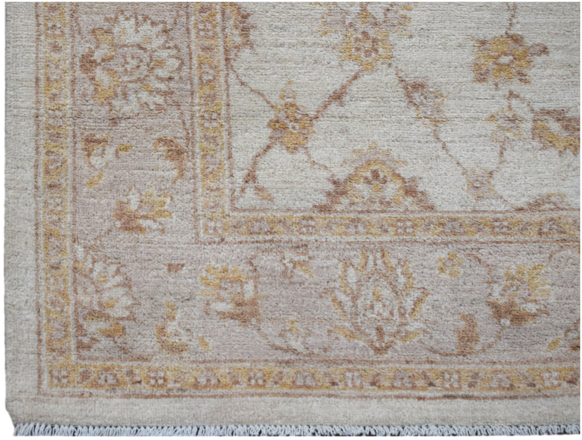 A handwoven Afghan Chobi rug featuring a traditional floral pattern in soft beige and wood tones.