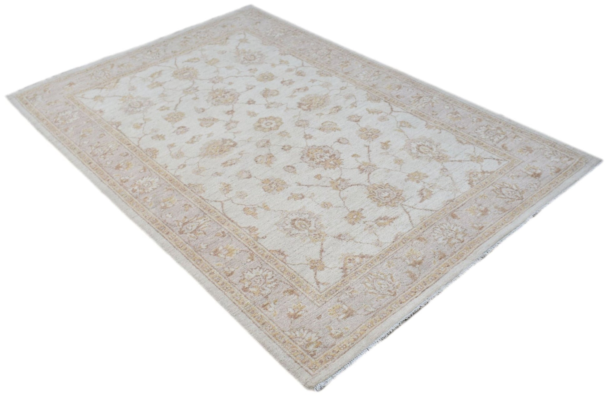 An Afghan Chobi rug featuring a traditional floral pattern in soft beige and tan tones.