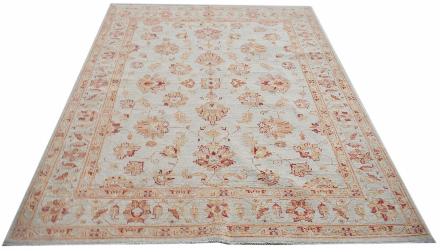 A rectangular Afghan Chobi rug featuring a traditional floral pattern in soft earth tones.