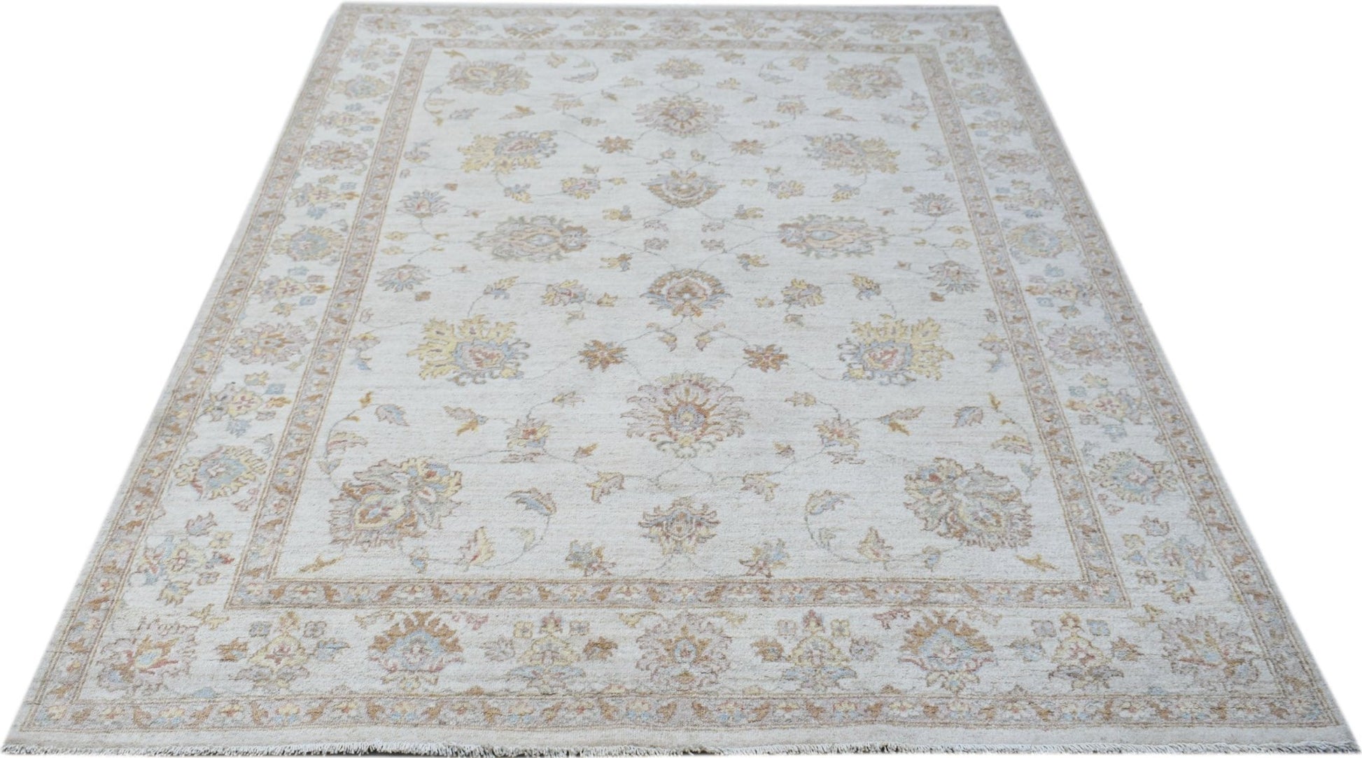 A rectangular Afghan Chobi rug featuring a traditional floral pattern in soft, earthy tones.