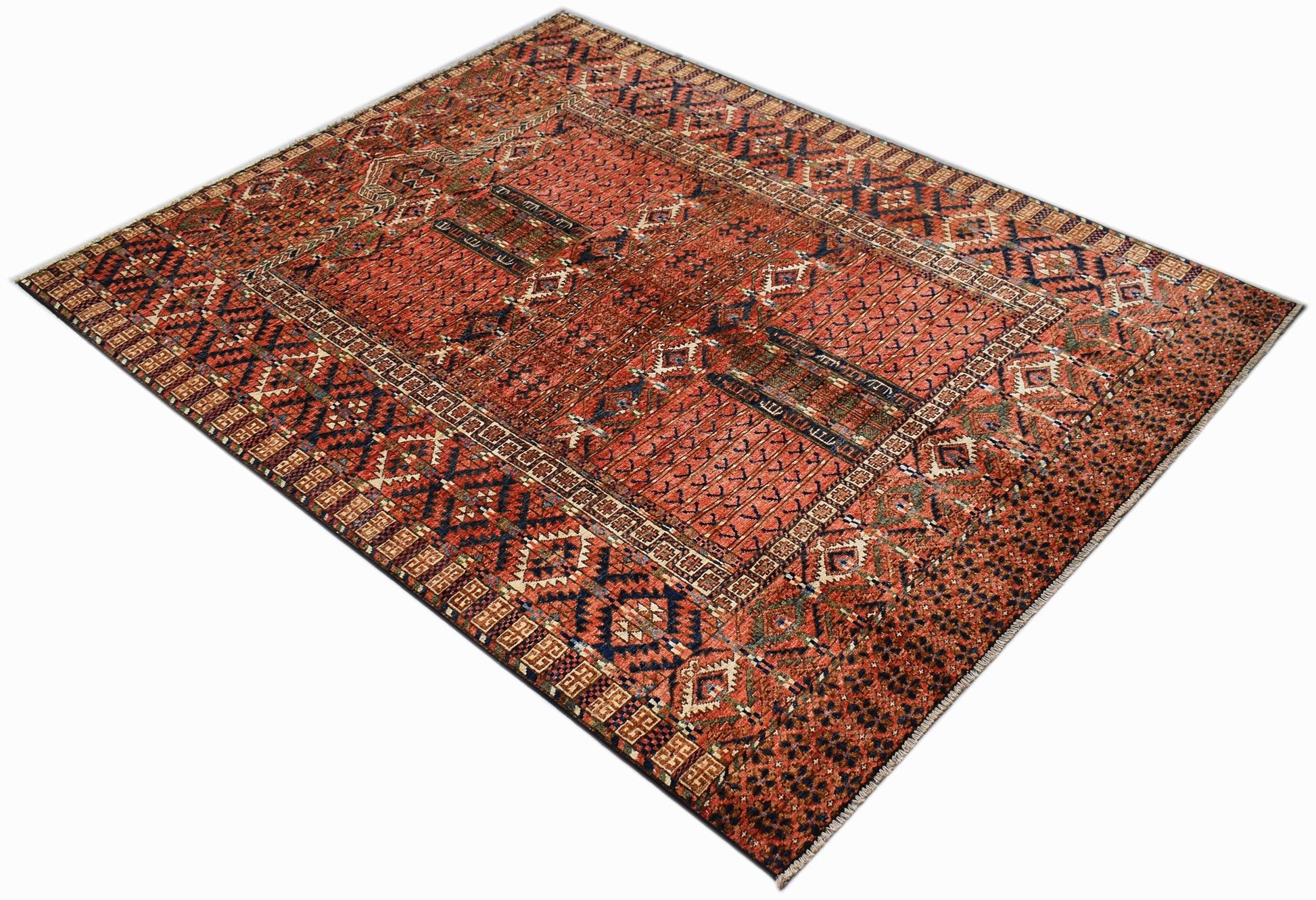 A rectangular Afghan Chobi rug featuring traditional geometric patterns in warm earthy tones.