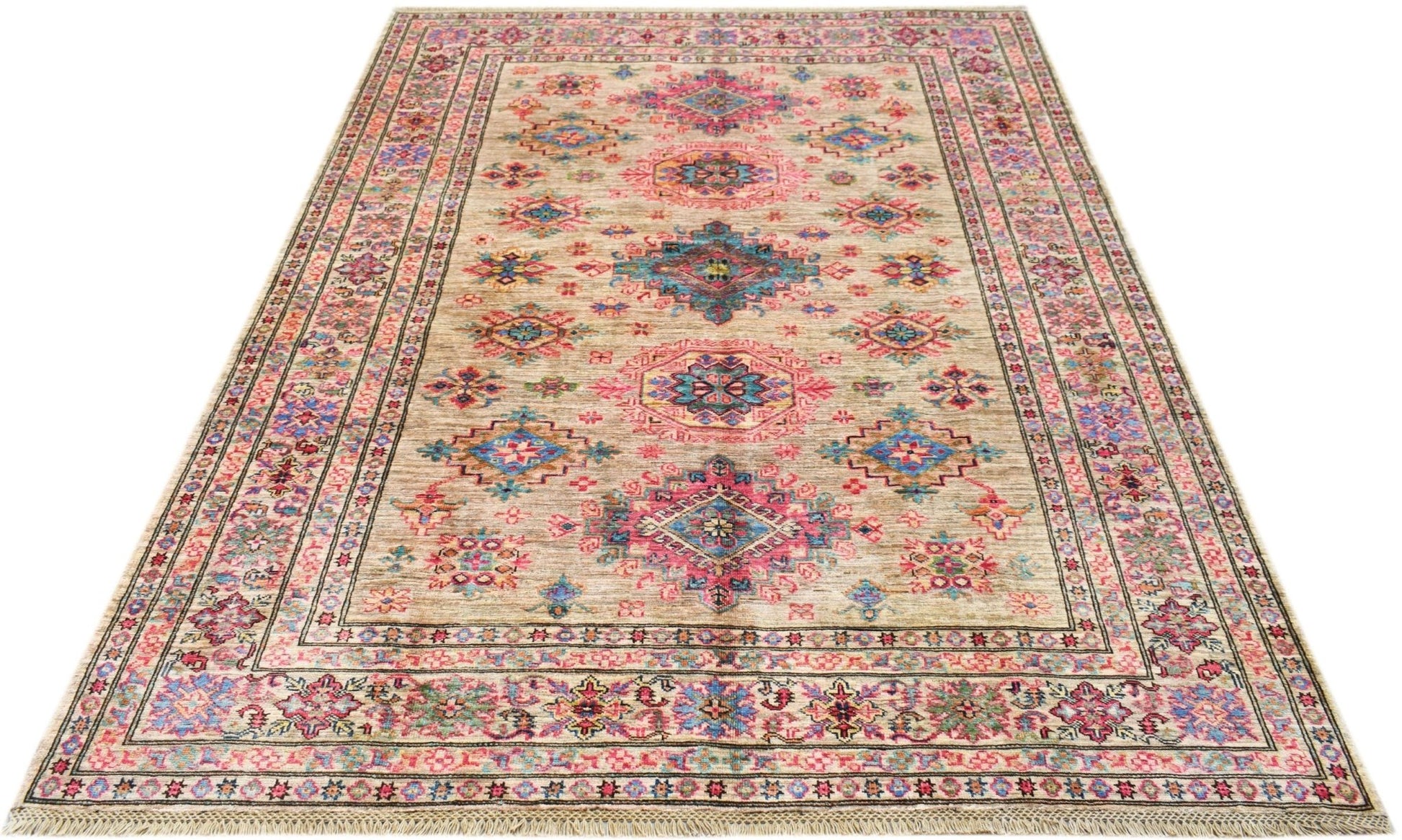 An Afghan Super Kazakh rug featuring a traditional geometric pattern in pink, blue, and tan wool.