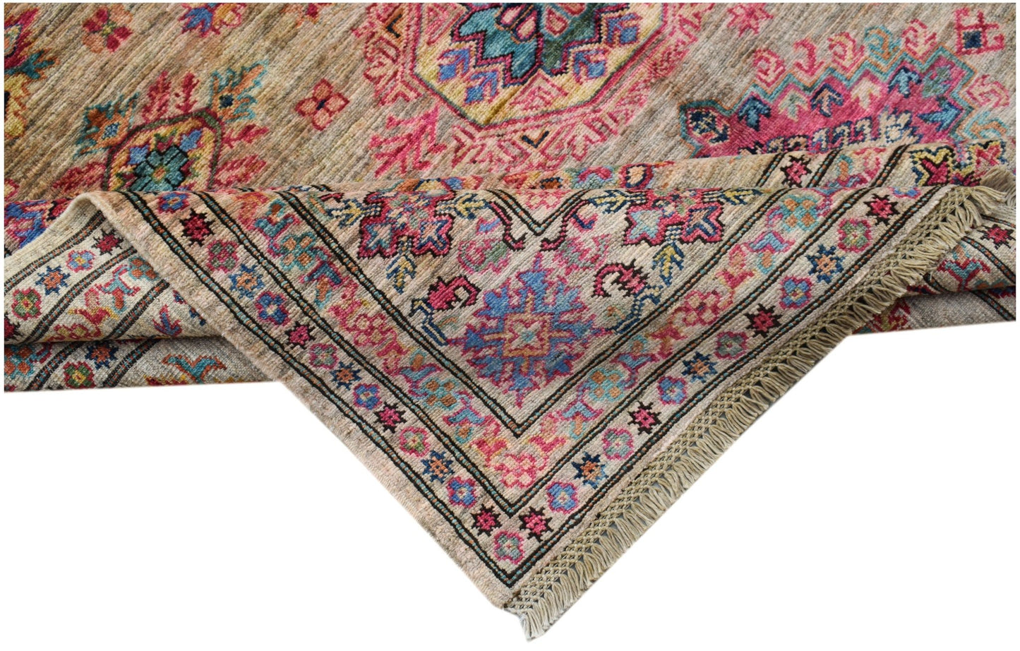 A handwoven Afghan Super Kazakh rug featuring a traditional geometric pattern in pink and blue.