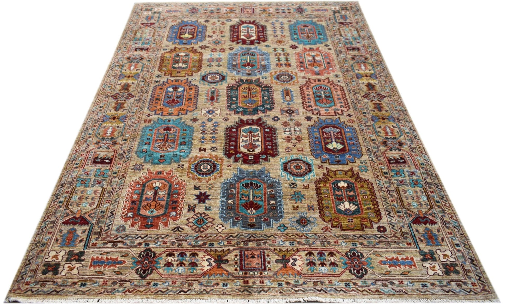An Afghan Chobi rug featuring a traditional geometric pattern in vibrant colors on a tan background.